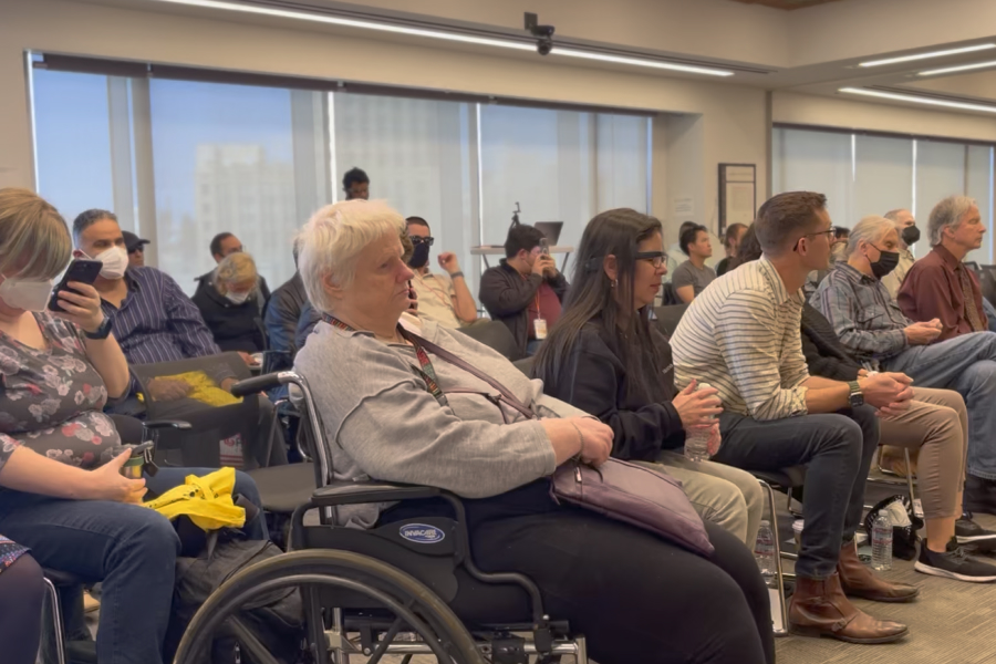 A crowd of people sitting to watch presentations at Inclusive Innovations 2023.