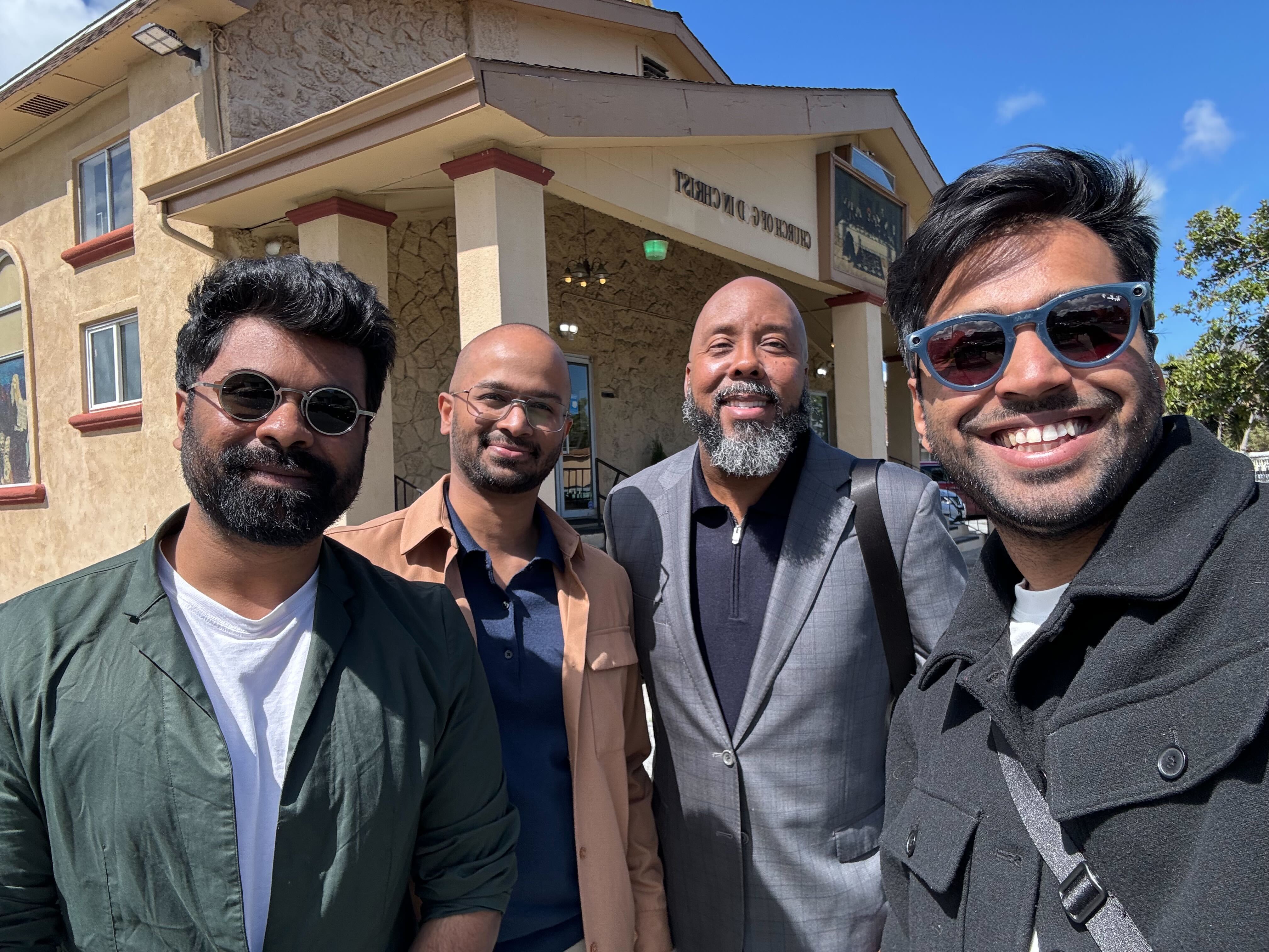 bhagya and the two karthiks from envision with pastor albert outside his church in palo alto
