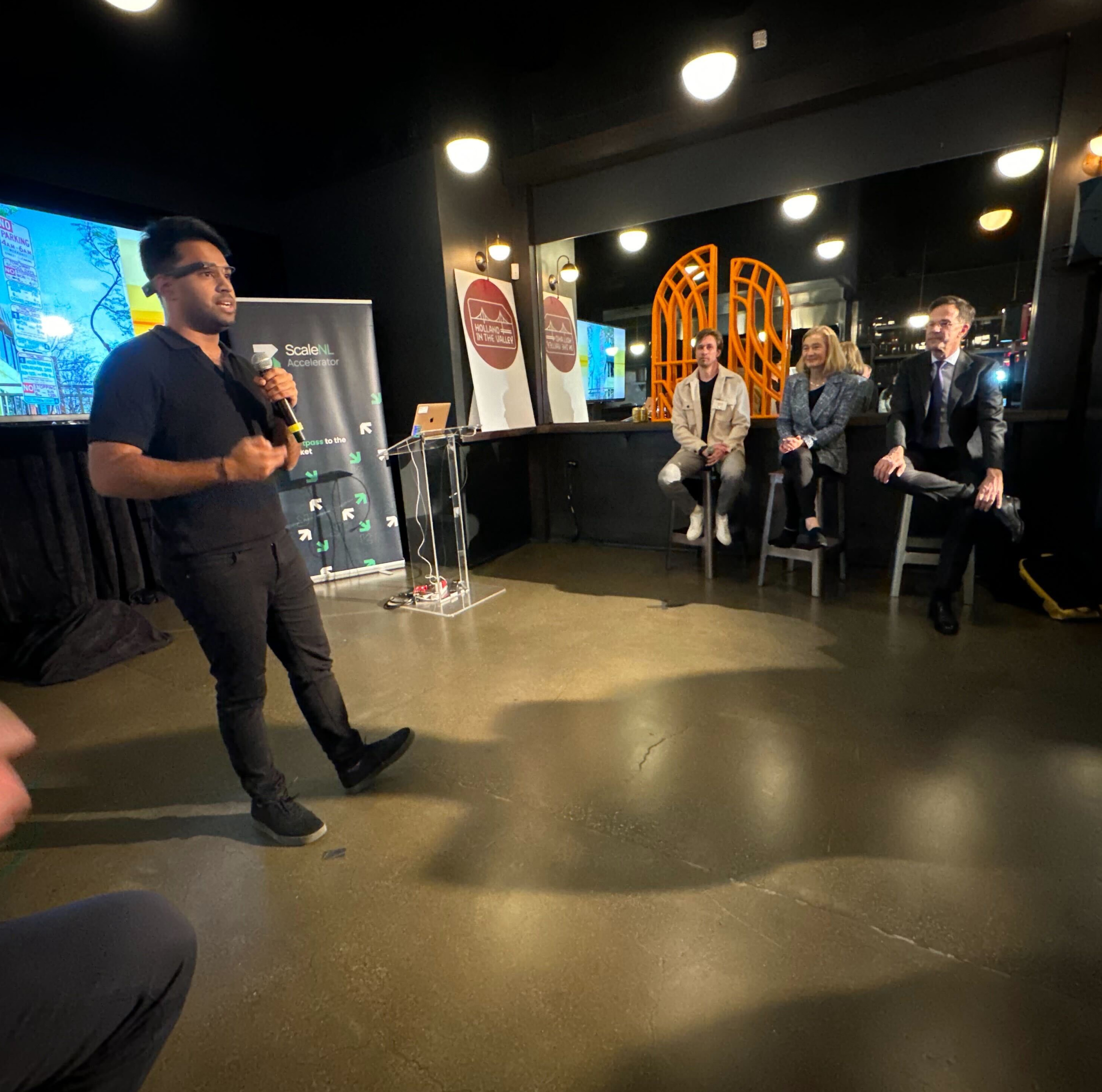 Karthik Mahadevan talking in front of Scale NL accelerator.