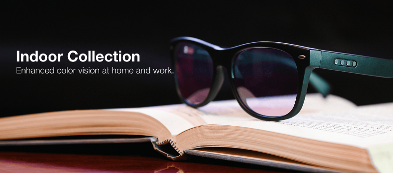 Image of an indoor eyewear of EnChroma placed on a book.