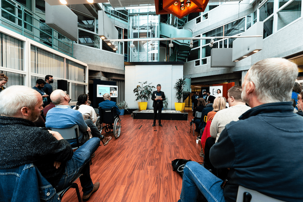 Photo taken at DTFA showing a group of people taken from the back of the crowd