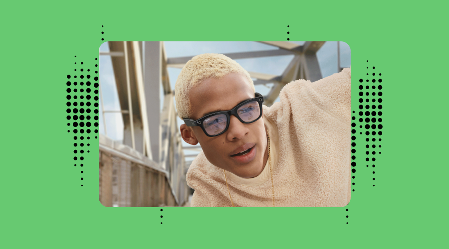 A young individual with blonde hair and Ray Ban Meta glasses, dressed in a beige fleece outfit, looks away from the camera with a thoughtful expression. They are outdoors with what appears to be part of a bridge structure in the background. The image is framed with a dotted pattern on a green background.