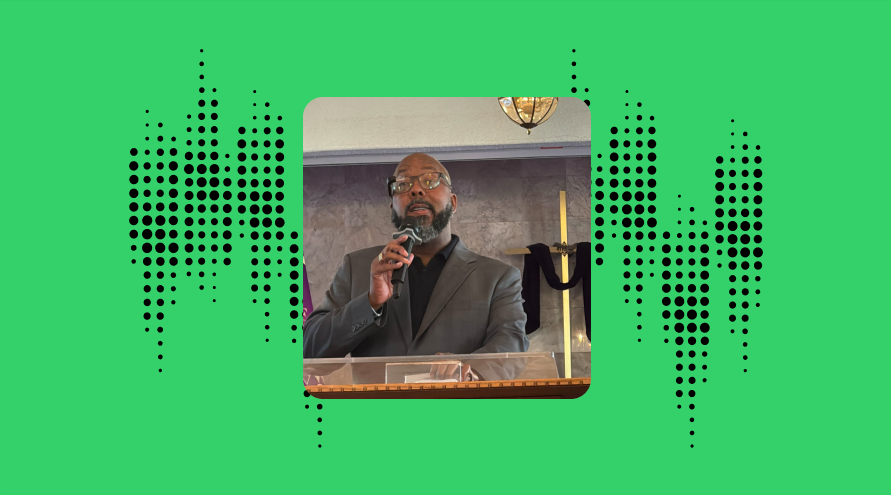 pastor albert at church wearing the envision glasses